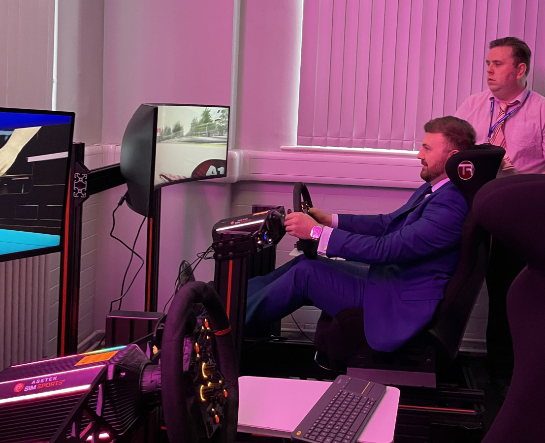 MP Chris Webb tries a driving simulator at LCIoT