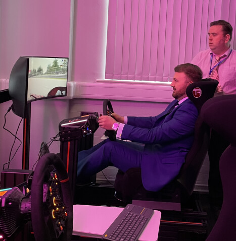 MP Chris Webb tries a driving simulator at LCIoT