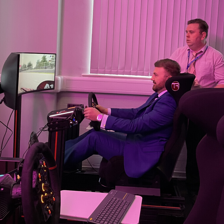 MP Chris Webb tries a driving simulator at LCIoT